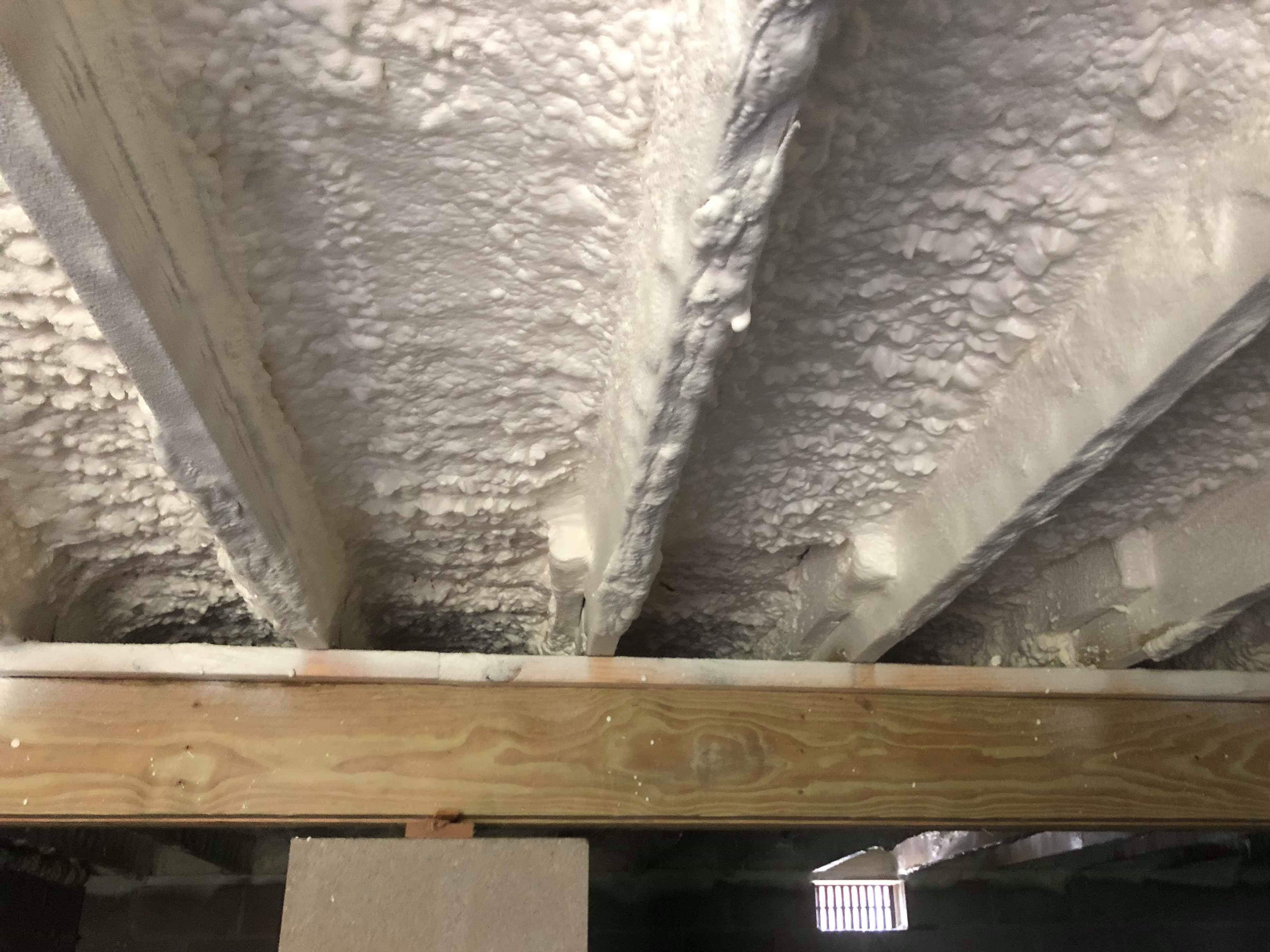 Sub-floor with closed cell foam insulation