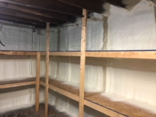 Insulation behind shelves